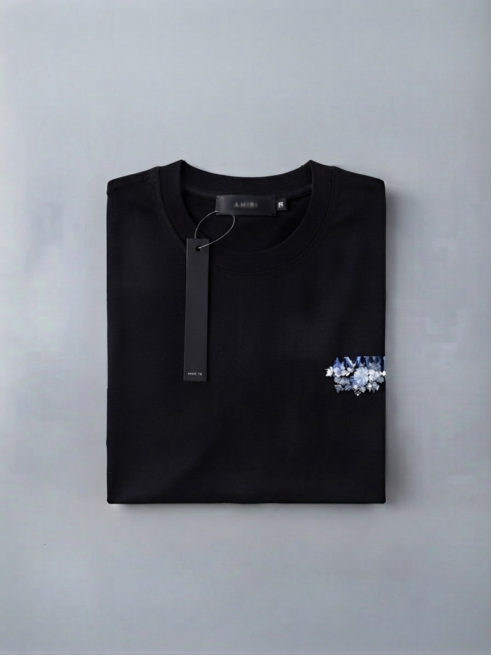 Ami Black Short-Sleeve Crewneck Tee with Blue Floral Chest Detail
